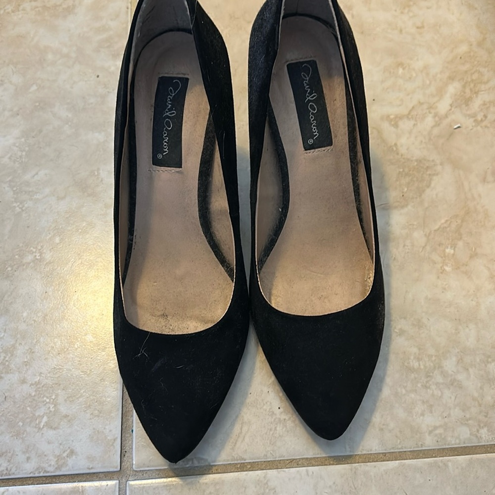 Black suede pumps